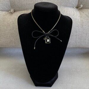 Dyrberg/Kern Runar leather bow and Swarovski crystal necklace